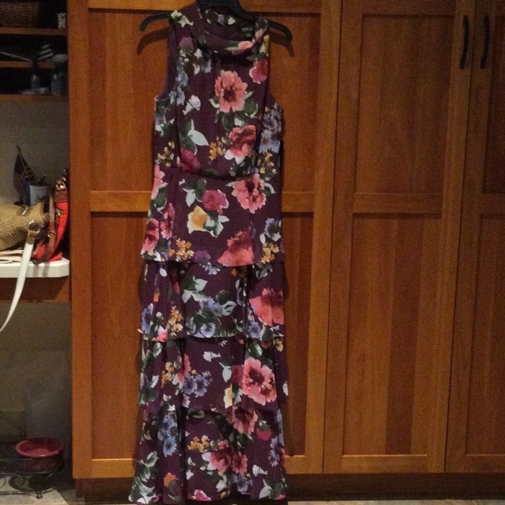 Semi formal floral dress, size 12. Floral patterned with layered skirt